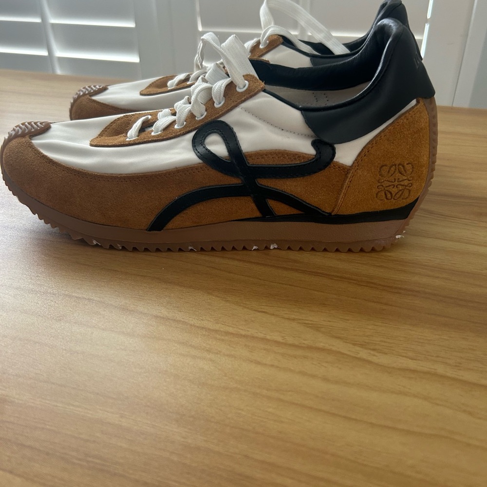 Brown and black sneakers